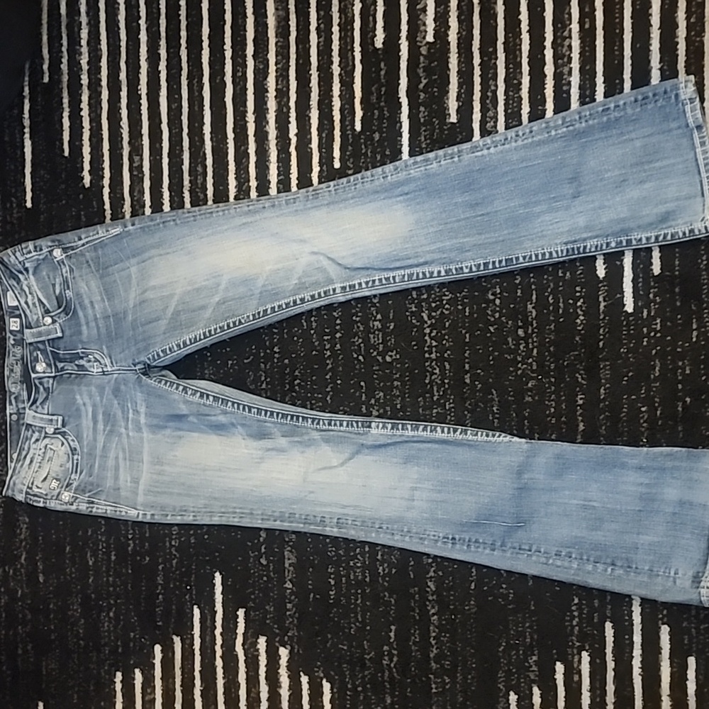 Miss Me angel wing size 28 light distressing med ish wash jeans